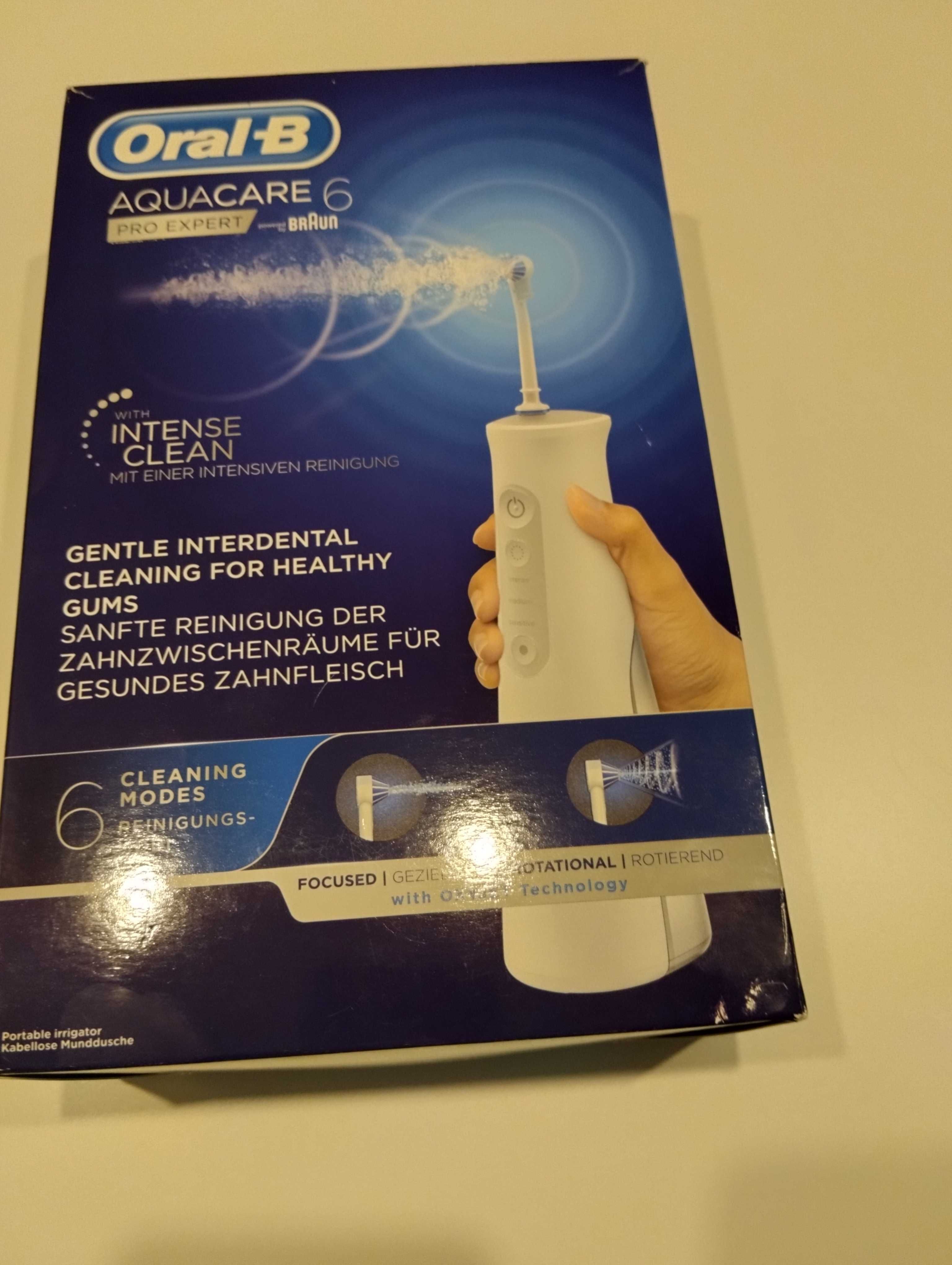 Irrigador oral para higiene bocal