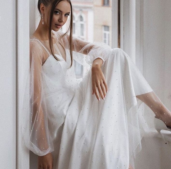 Елегантна весільна сукня