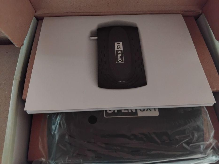 Спутниковый тюнер новый !