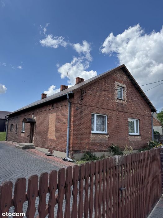 Dom wraz z zabudową gospodarczą