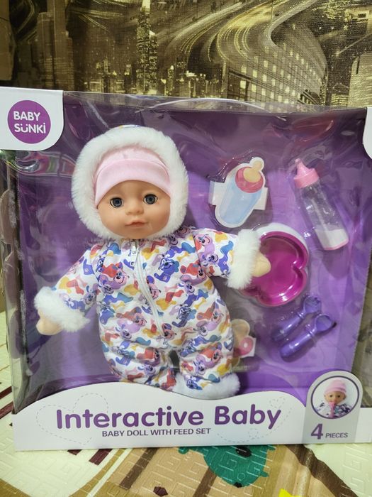 Пупс м'яконабивний інтерактивний.