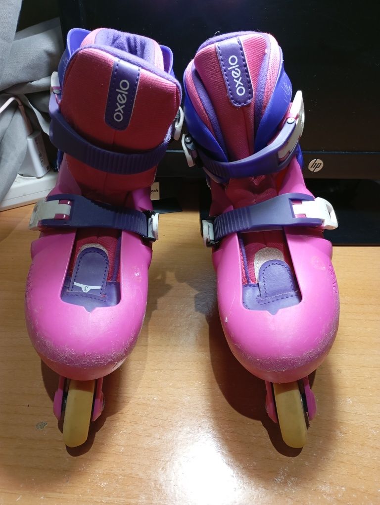 Patins em linha rosa