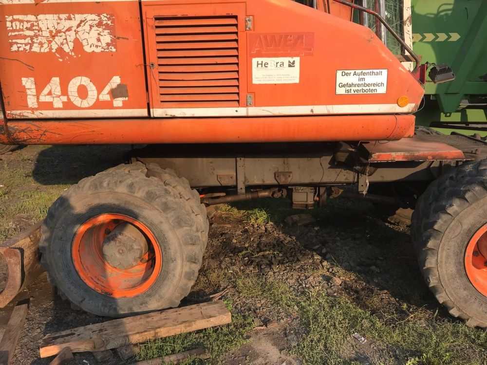 Ескаватор Atlas 1404