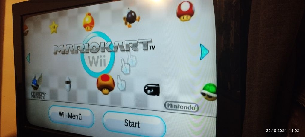 Konsola Nintendo Wii+ okablowanie+ gry