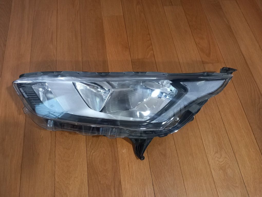 Farol optica frente esquerda Ford Transit Connect do ano 2018 a 2025.