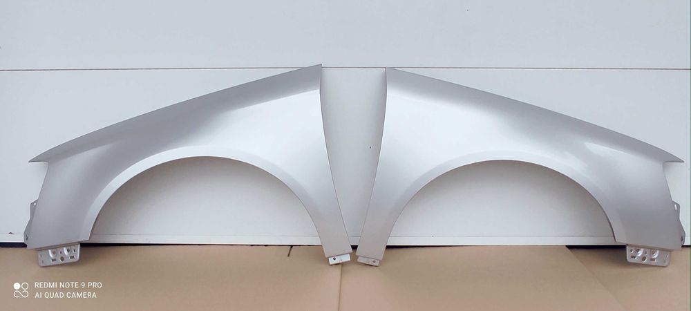 Komplet błotników VW Passat B6 LA7W srebrny – lewy + prawy nowe