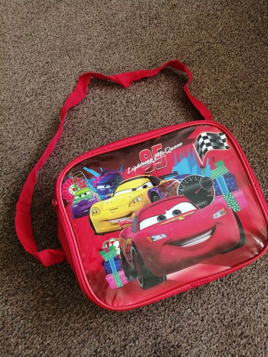 Червона сумочка для хлопчика