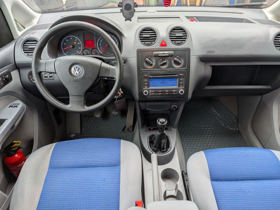 Caddy,7 osób ,1.6 benzyna ,klima, zarejestrowany