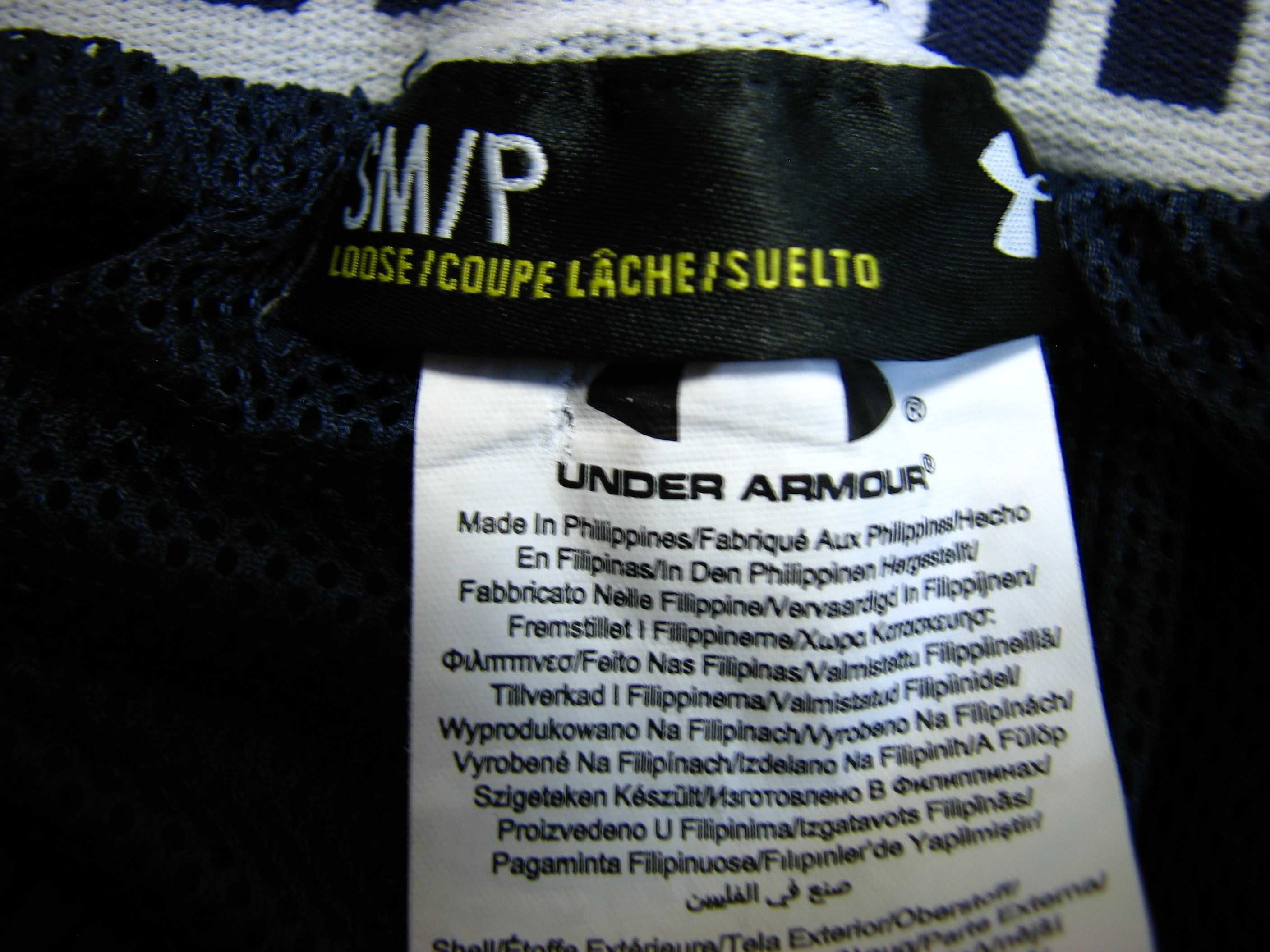 Poliestrowe spodnie dresowe Under Armour Powerhouse Woven