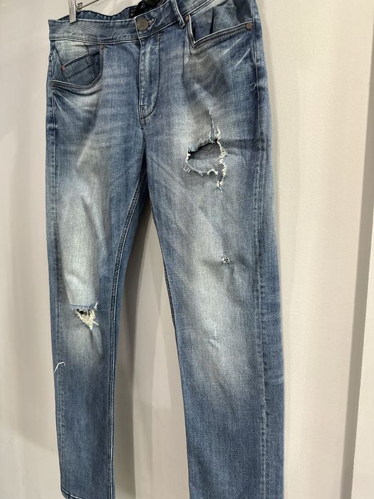 Męskie spodnie jeansowe Reserved rozm W34 L32 rozm L