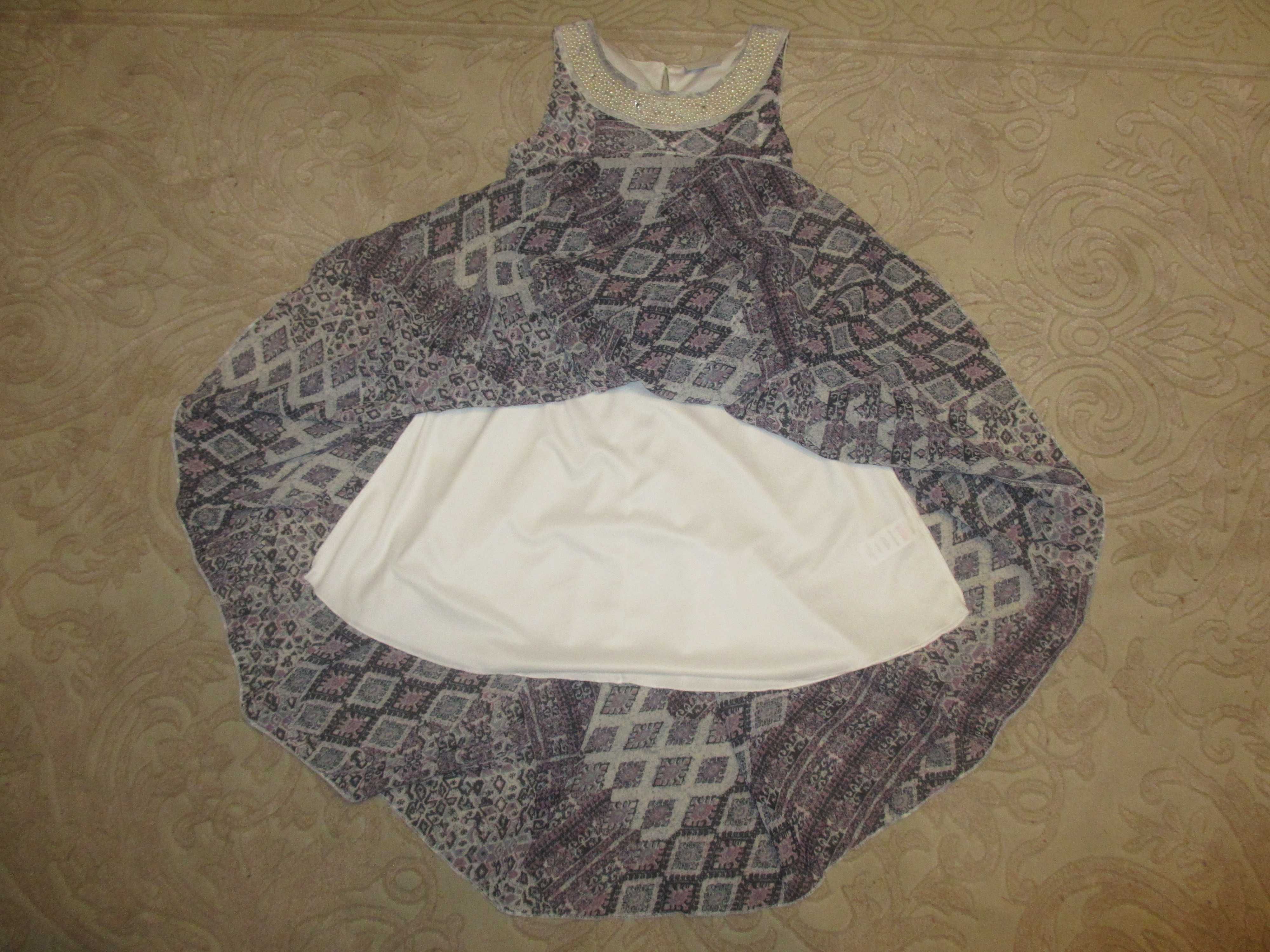 Детское нарядное платье с плетеным ремешком