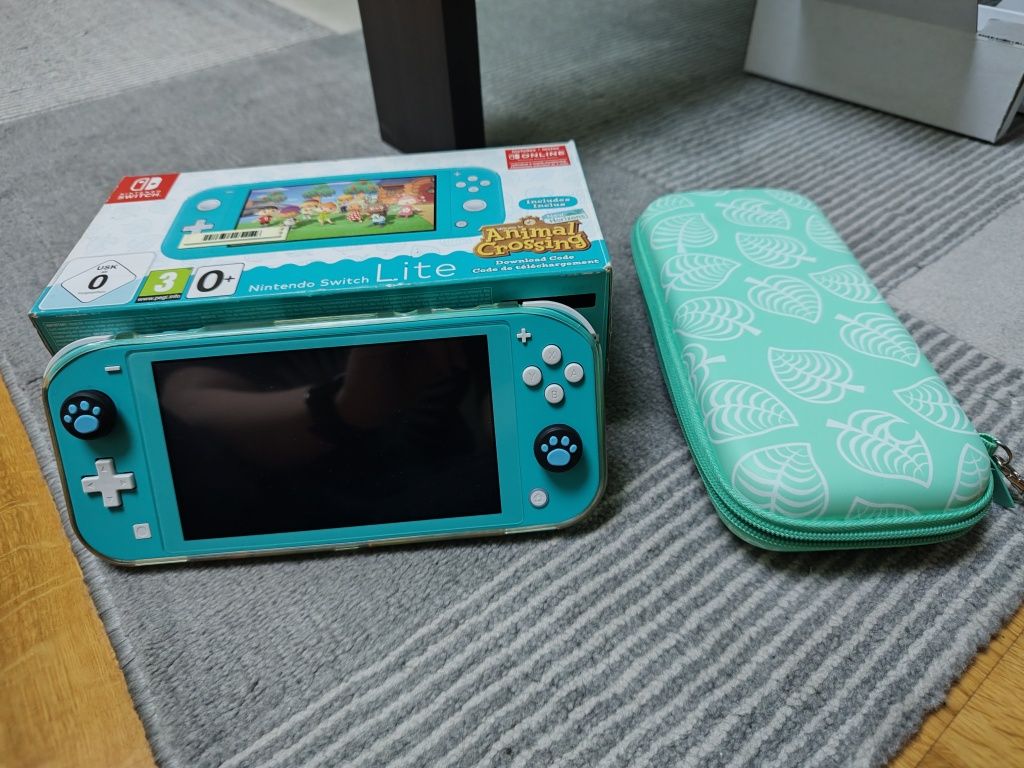 Nintendo Switch Lite ACNH edition + etui, gry i szkielko