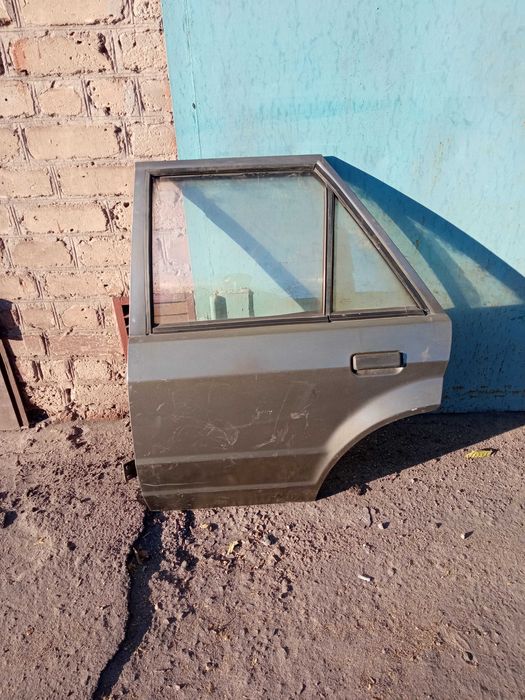Задняя дверь Форд Эскорт мк4 Ford Escort разборка