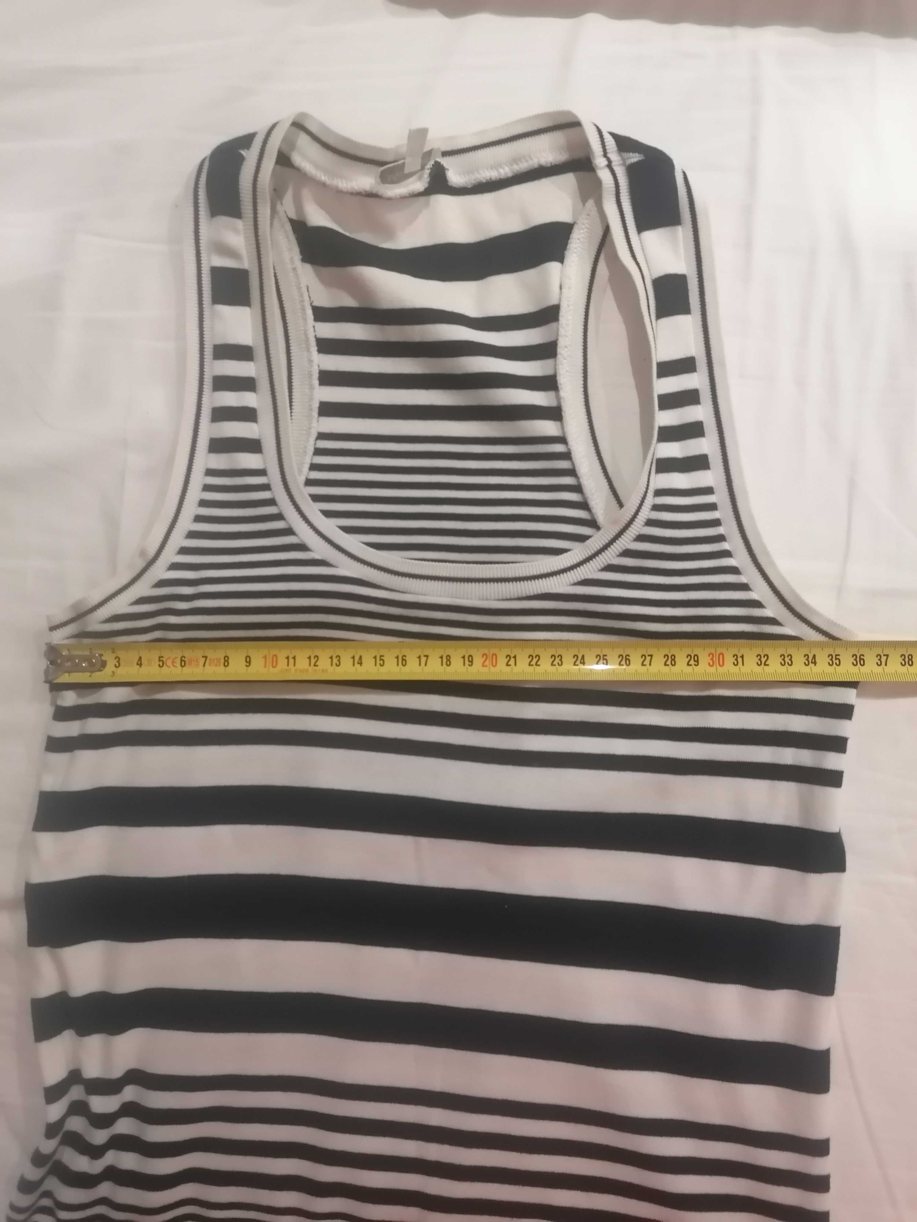 T shirt sem mangas às riscas.