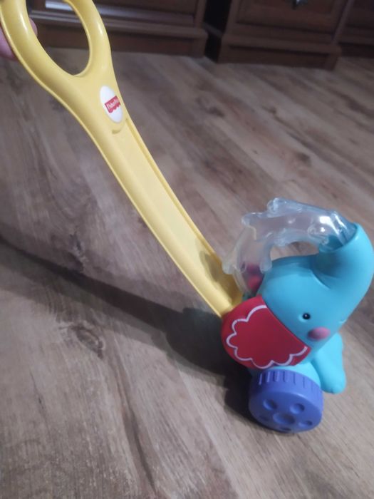 Fisher-Price, Jeżdzący słonik z piłeczkami, zabawka edukacyjna