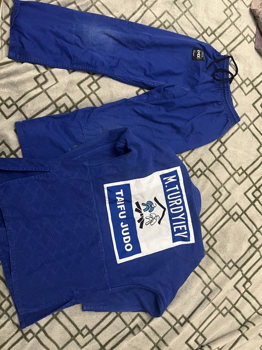 Продам кимоно для дзюдо 140см неAdidas