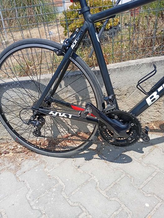 Bicicleta de estrada de gama média