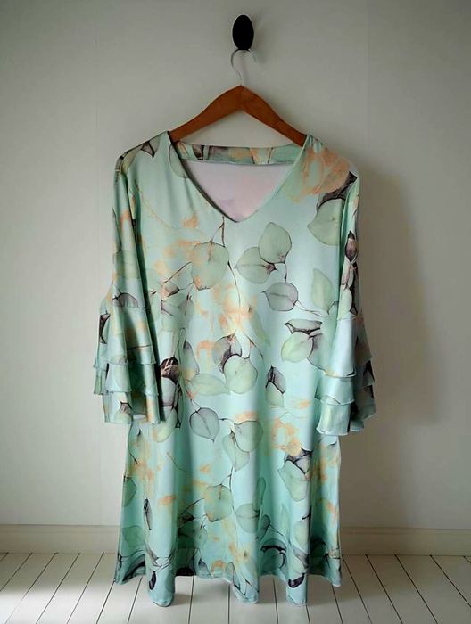 Śliczna miętowa sukienka szerokie rękawki rozmiar 46/48