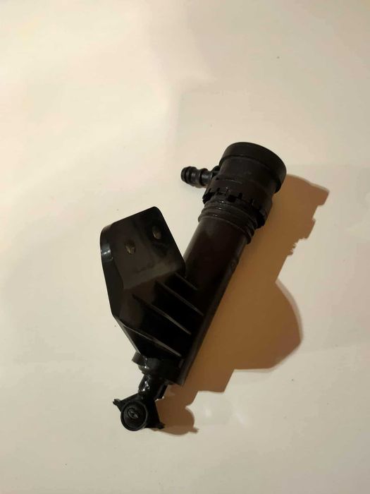 Spryskiwacz reflektora lewy Hyundai IX35