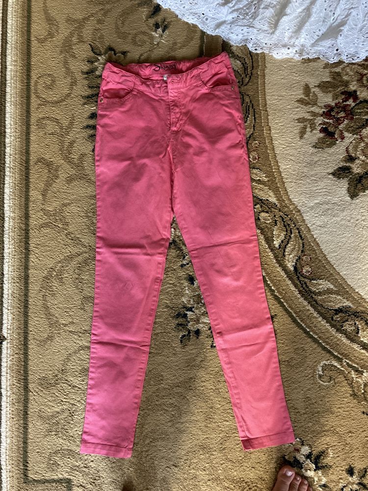 продам джинсы розовые