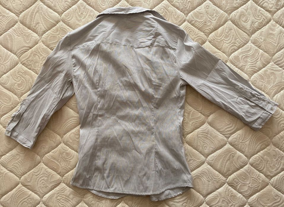 Blusa brilhante de manga 3/4 da Zara