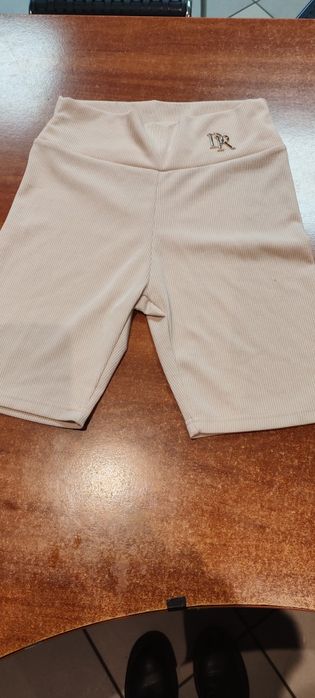 Nowe legginsy beżowe