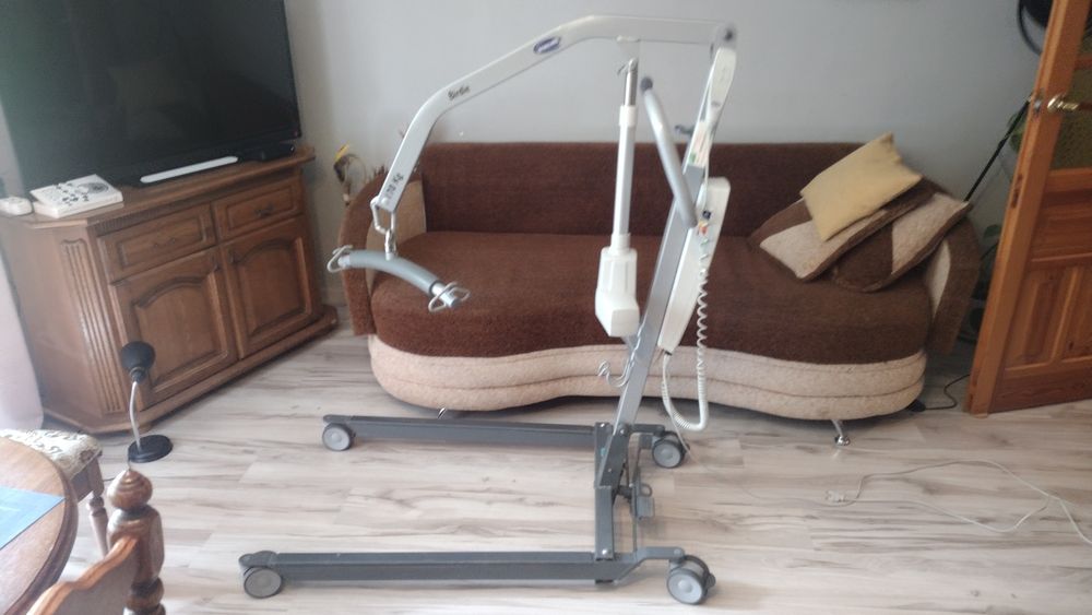 Podnośnik asystent elektryczny do podnoszenia osób/pacjentów