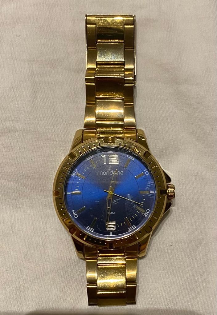 Relógio mondaine masculino dourado