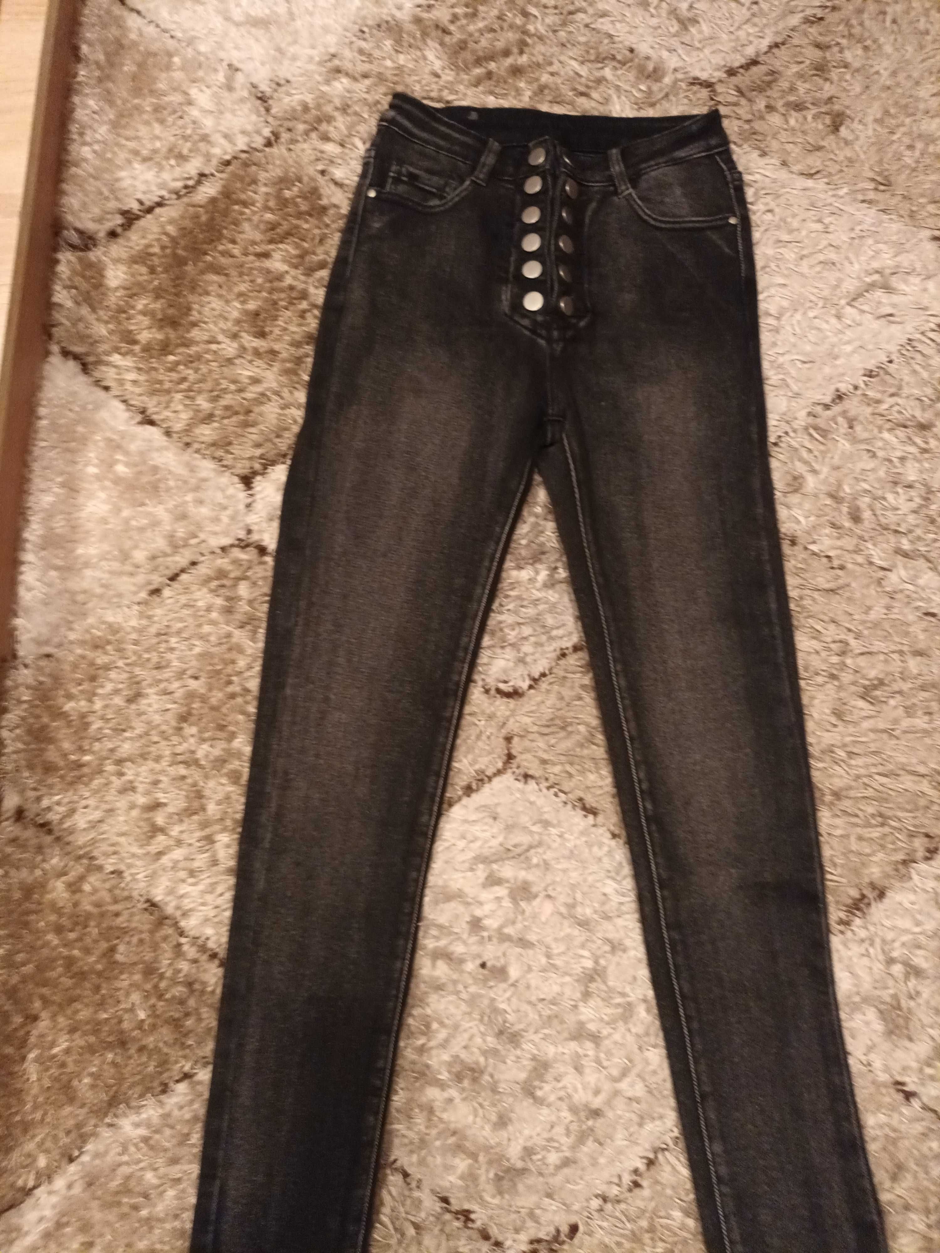 Spodnie jeansy nowe M