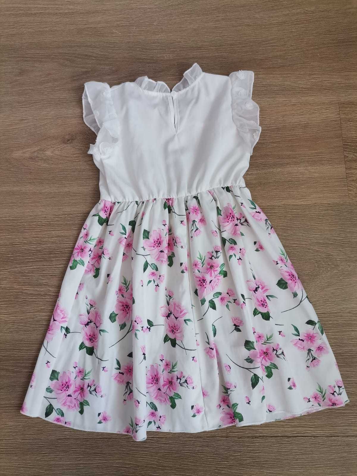 Sukienka w kwiaty dla dziewczynki rozm. 122/128cm - stan bdb.