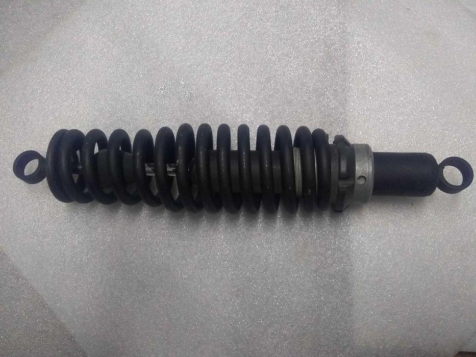 Пара нових амортизаторів снігоход