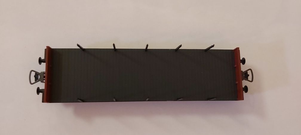 Wagon platforma z kłonicami PIKO 58414-3 PKP H0
