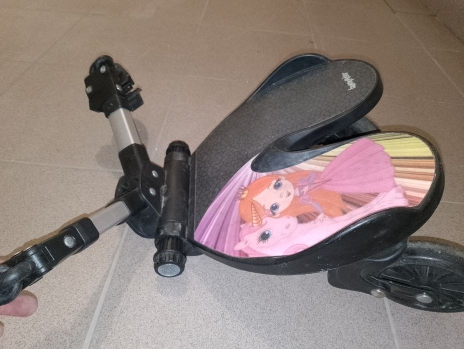 Dostawką do wózka BumpRider