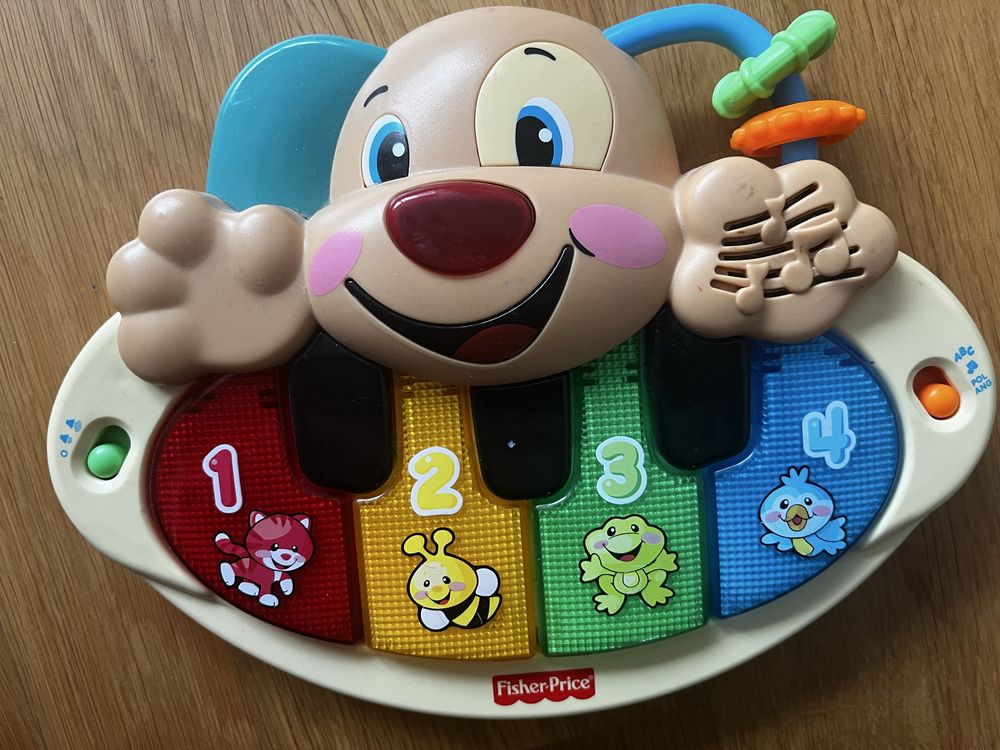 Grajacy piesek pianinko Fisher Price