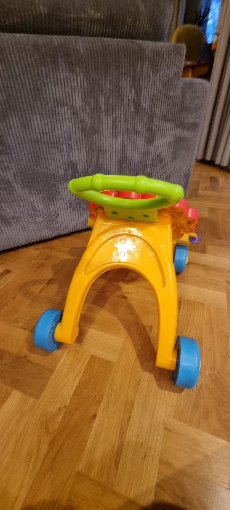 Chodzik pierwsze kroki Lew Fisher Price dla maluszka