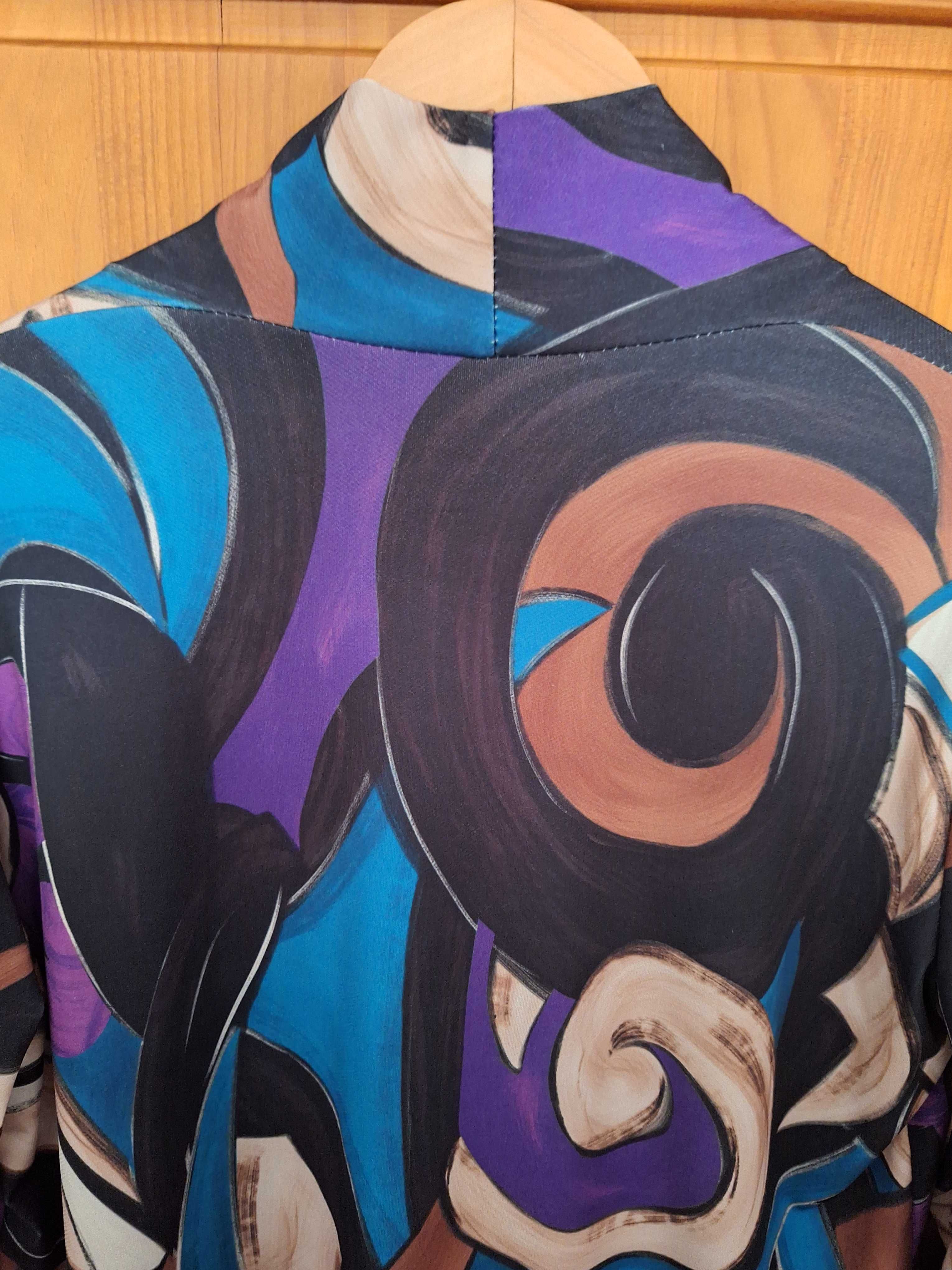 Blusa vintage com padrão colorido, muito bonito e original