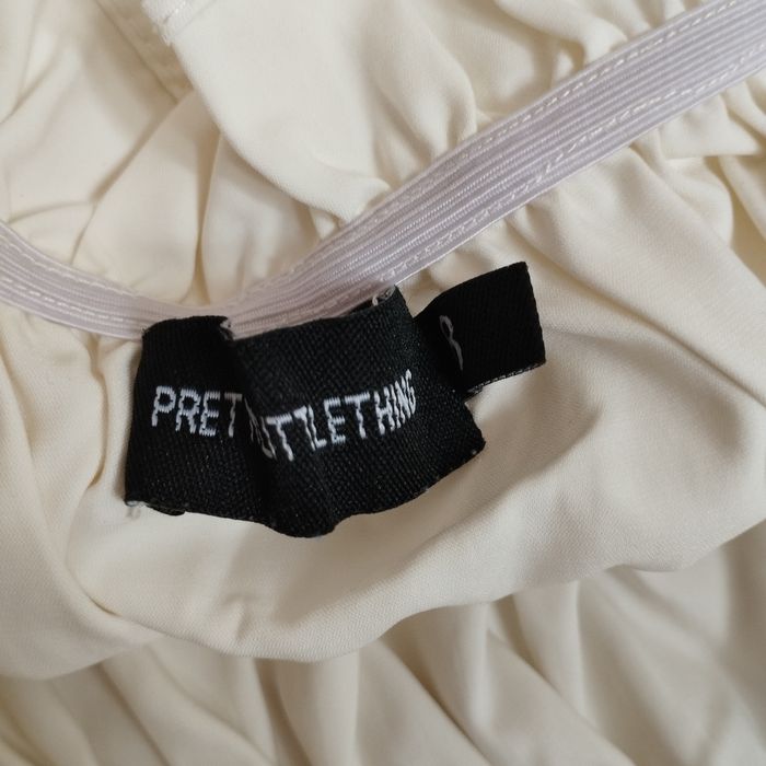 Bluzka PrettyLittleThing, rozmiar 36 – kremowy crop top bufiasty rekaw