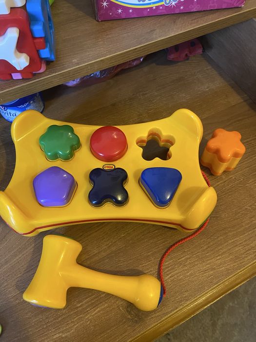 Дерев'яні кубики,куб сортер, стукалка Tolo,каталка Battat