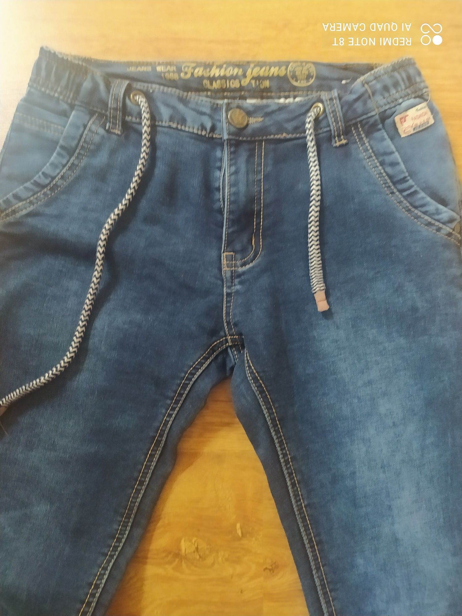 Spodnie dla chłopca  jeansy Niebieski Księżyc i dresy 146
