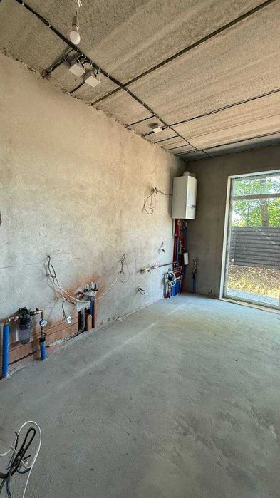 Таунхаус з ремонтом (під чистове оздоблення) в Ірпені.