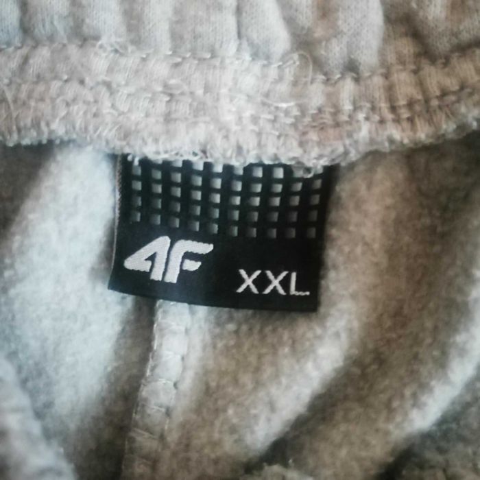 Spodnie dresowe duże męskie 4F