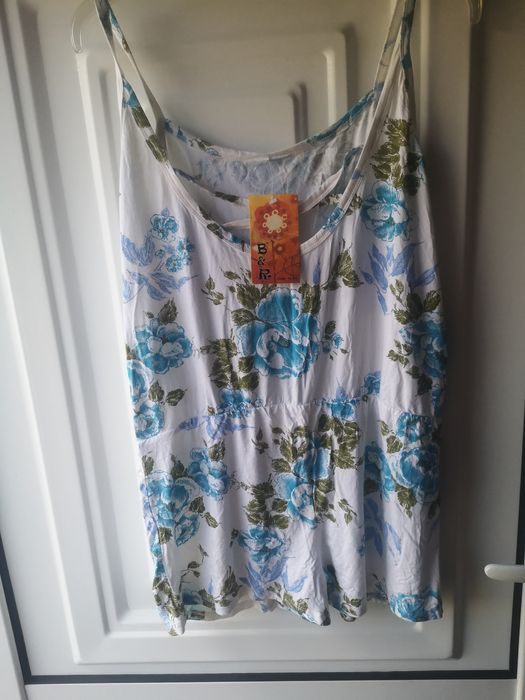 Macacão novo com etiqueta