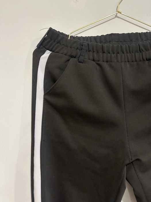 Sportowe spodnie damskie czarne na gumce S/M