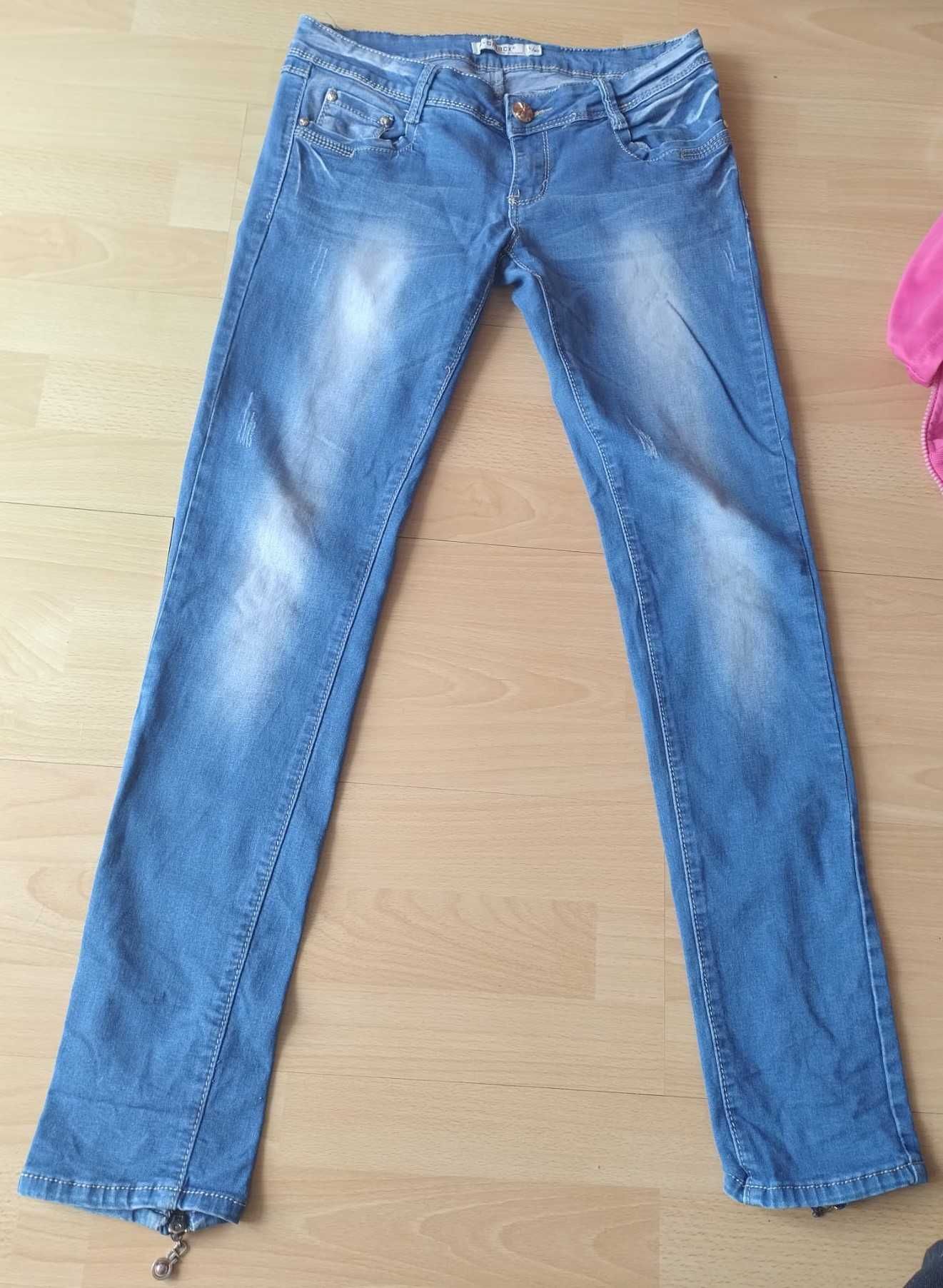 Jeansy biodrówki z zamkami i zdobieniami, rozm. 40