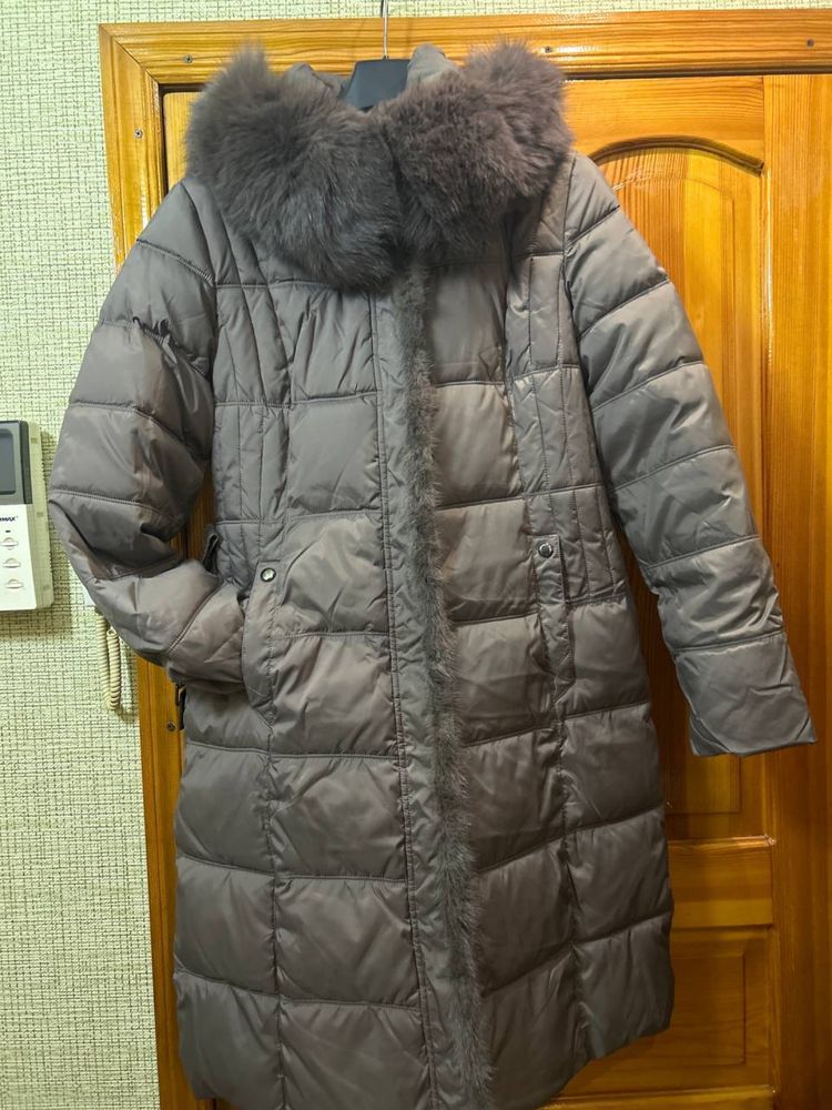 Продам  натуральный пуховик