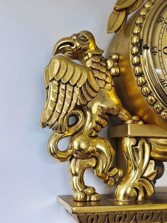 Zegar kartelowy - Svenskt Runa - zdobiony gryfami - złocony .