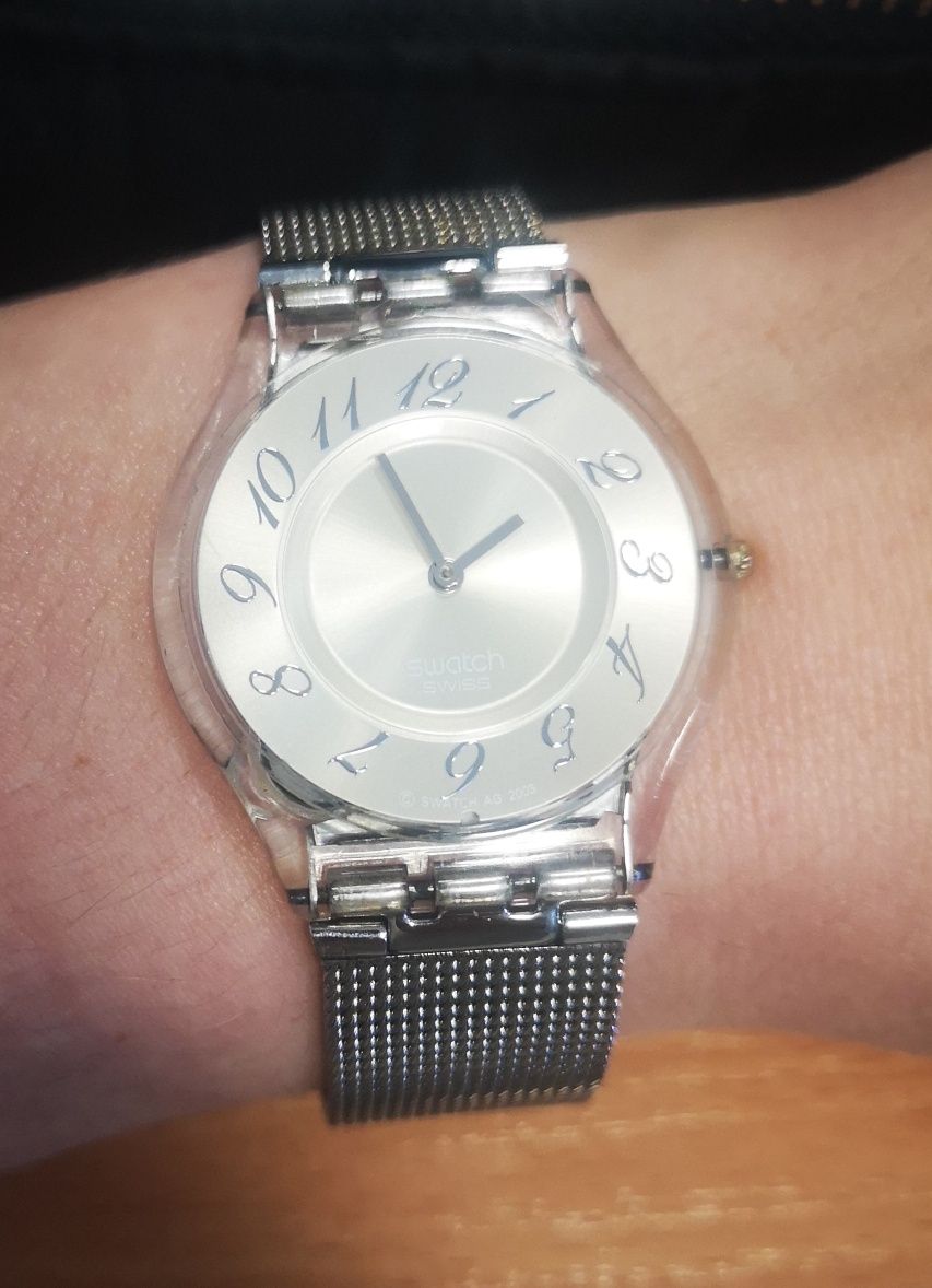 Srebrny zegarek swatch skin cienki lekki