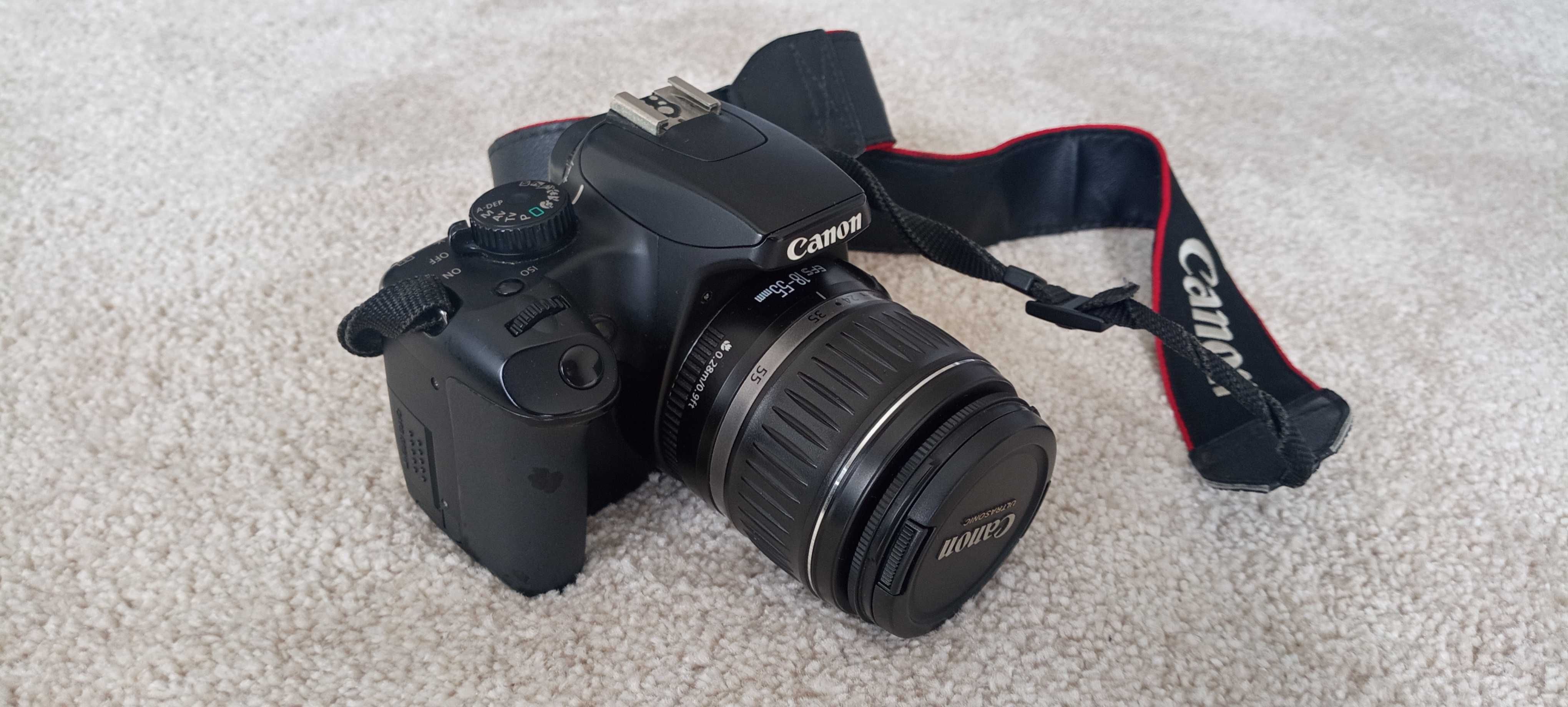 Canon EOS 1000D, com: objetivas 18-55 e 75-300; Carregador e Mala