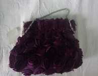 bolsa de cerimonia com rosas roxas nova