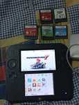 Consola Nintendo 2 DS com vários jogos e carregador
